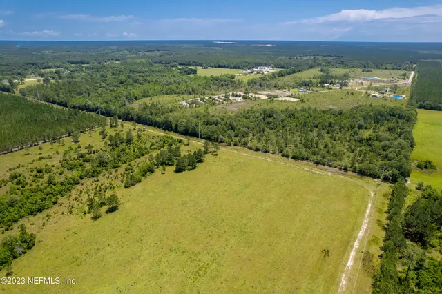 a view of a lake with a city