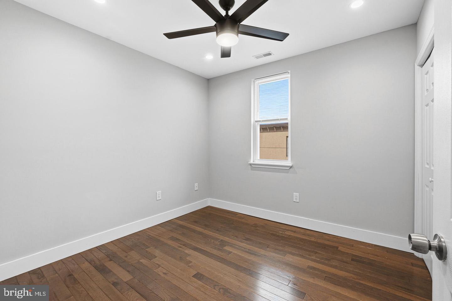 2106 Manton Street Philadelphia, PA 19146 - Photo 12 of 34 a view of a room with wooden floor and a ceiling fan