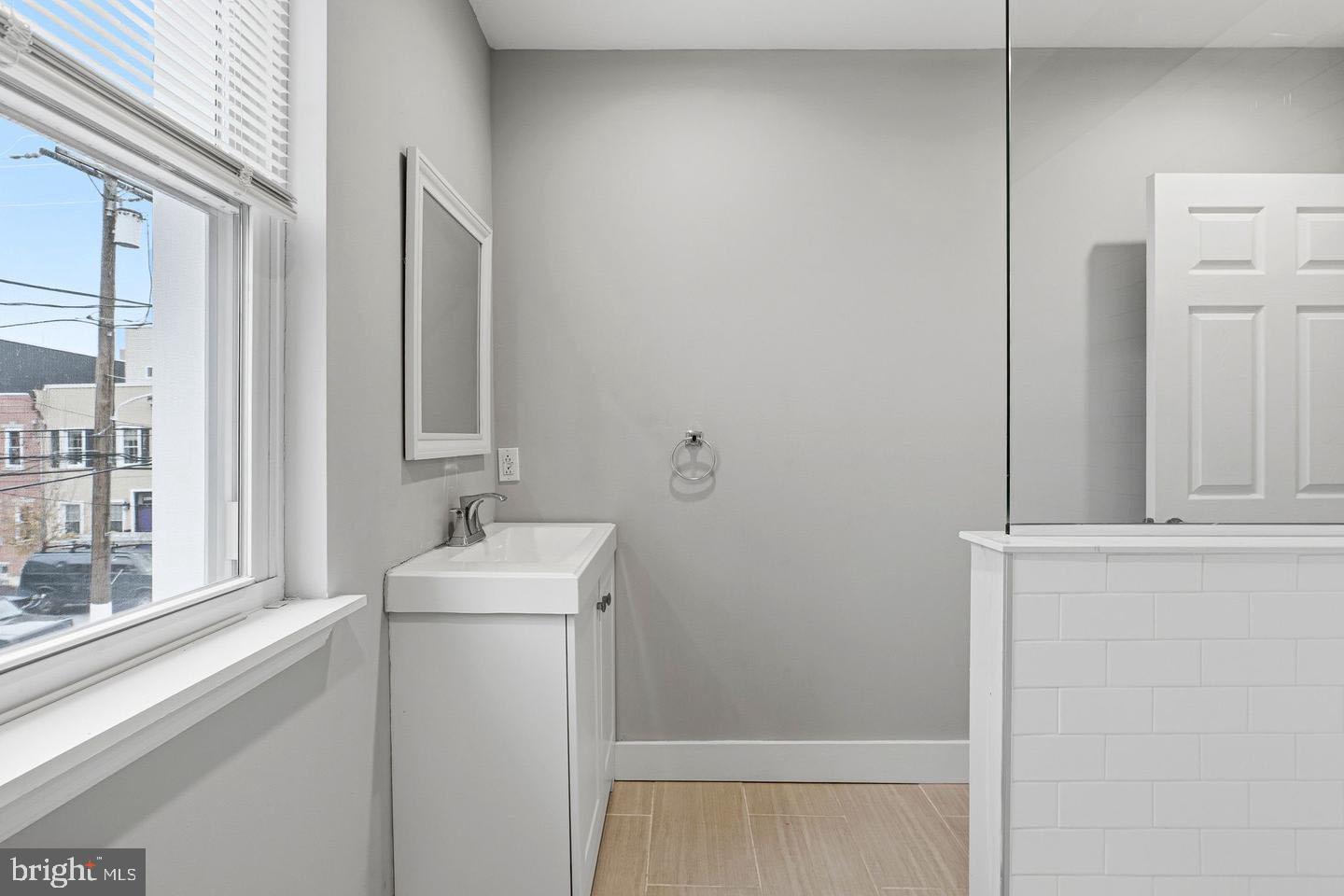 2106 Manton Street Philadelphia, PA 19146 - Photo 17 of 34 a bathroom with a sink and mirror