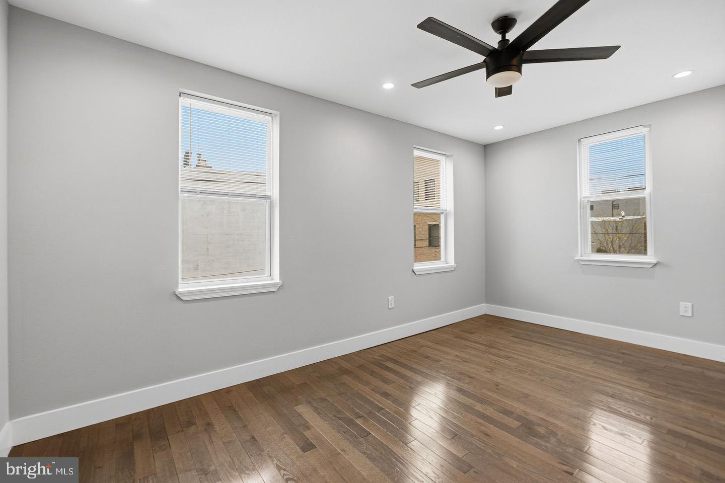 2106 Manton Street Philadelphia, PA 19146 - Photo 20 of 34 a view of a big room with wooden floor and windows