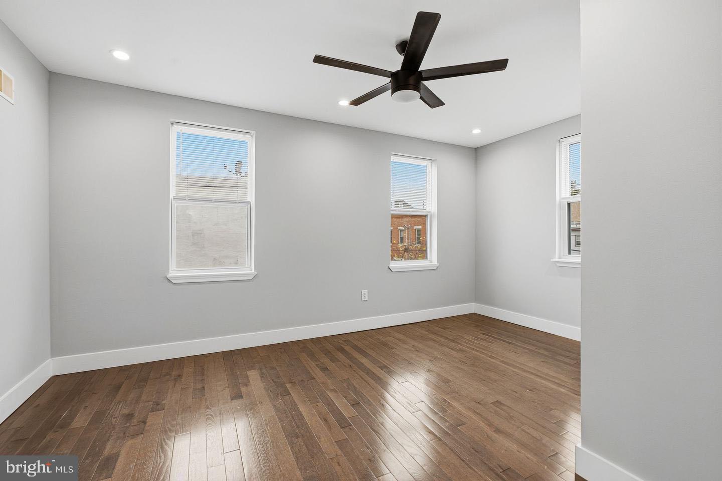 2106 Manton Street Philadelphia, PA 19146 - Photo 21 of 34 a view of empty room with wooden floor and fan