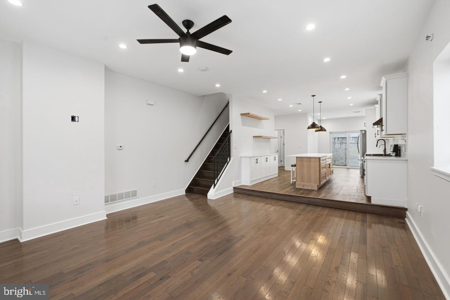 2106 Manton Street Philadelphia, PA 19146 - Photo 4 of 34 a view of a room with wooden floor and stairs