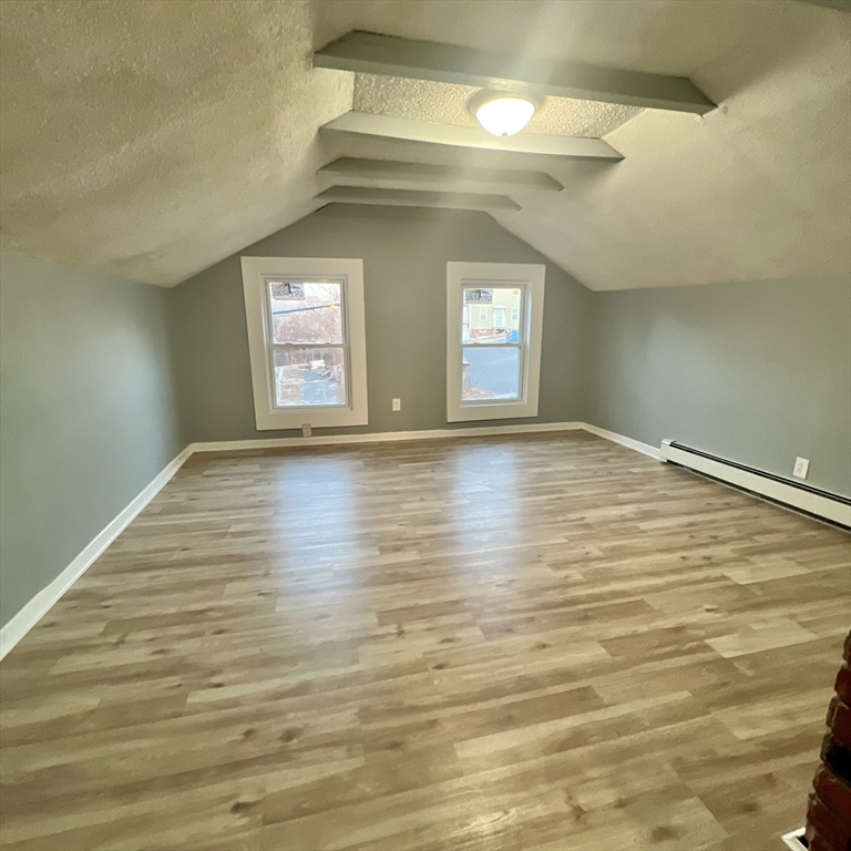 68 Springfield Street Chicopee, MA 01013 - Photo 22 of 41 a view of an empty room and window