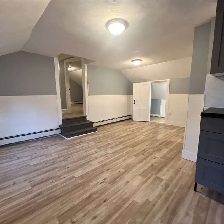 68 Springfield Street Chicopee, MA 01013 - Photo 27 of 41 a view of a room with wooden floor