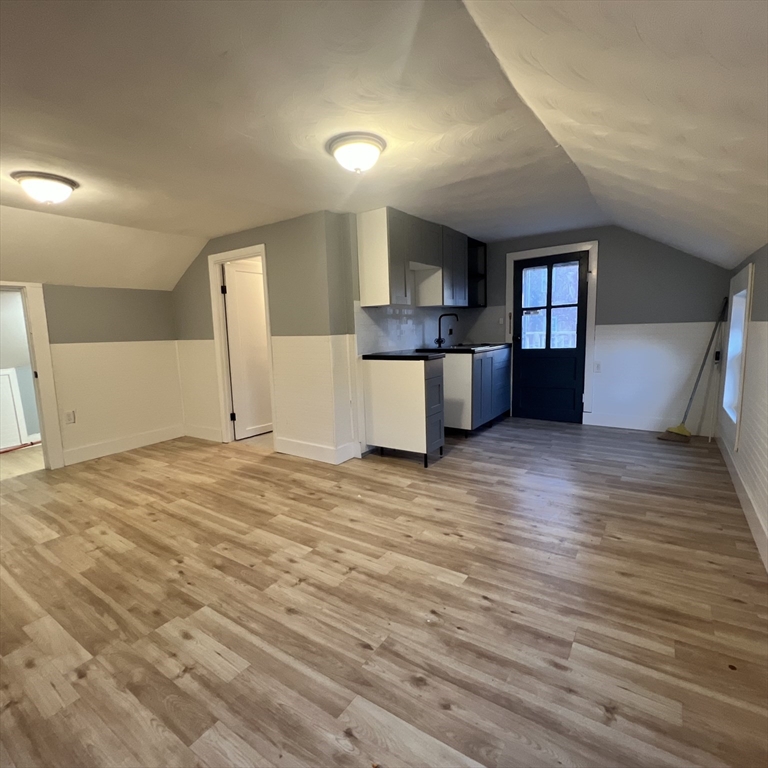 68 Springfield Street Chicopee, MA 01013 - Photo 28 of 41 a view of a kitchen with a sink and a window