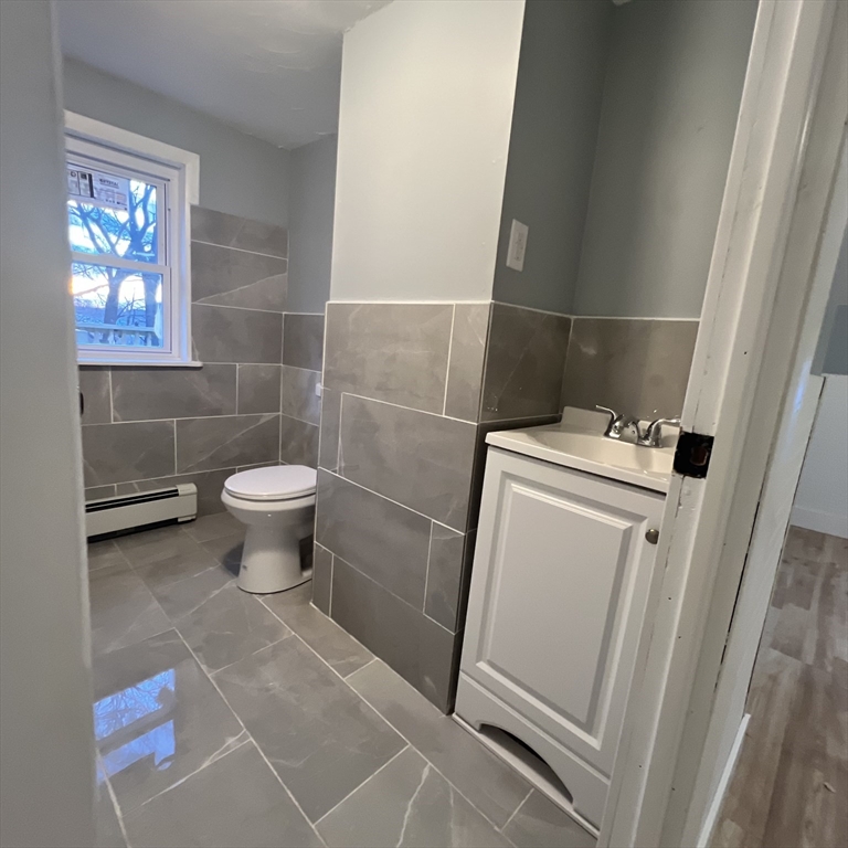 68 Springfield Street Chicopee, MA 01013 - Photo 29 of 41 a bathroom with a sink toilet and a shower