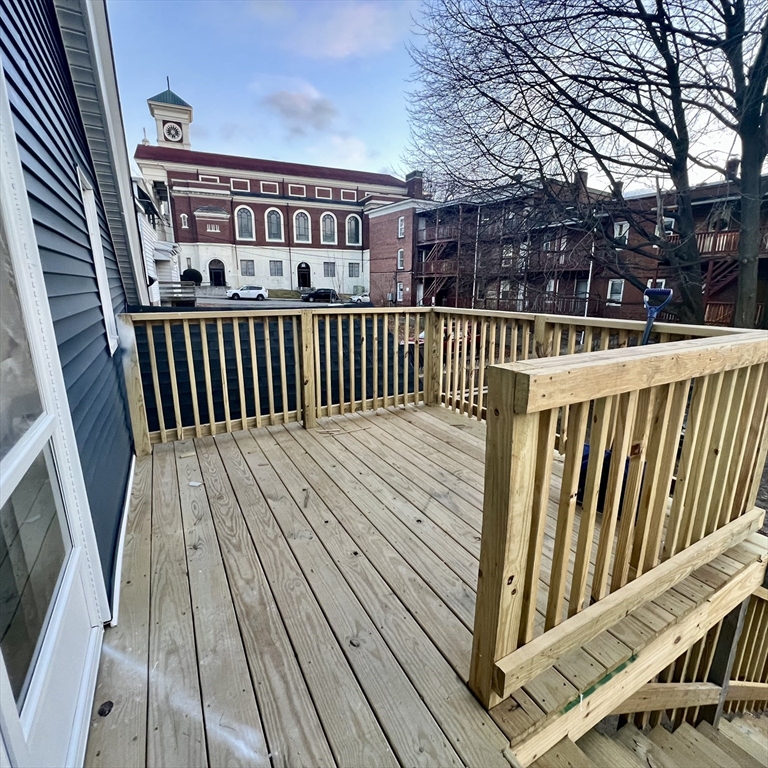 68 Springfield Street Chicopee, MA 01013 - Photo 32 of 41 a view of balcony with wooden floor