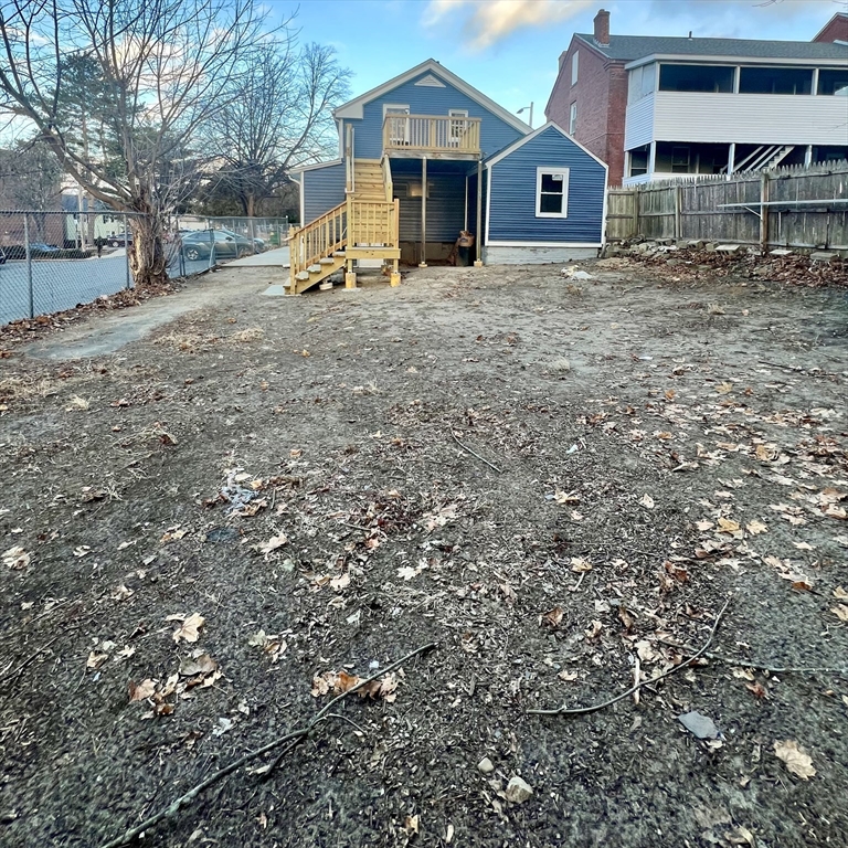 68 Springfield Street Chicopee, MA 01013 - Photo 5 of 41 a view of a house with a yard