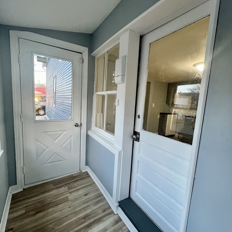 68 Springfield Street Chicopee, MA 01013 - Photo 8 of 41 a view of front door and bedroom