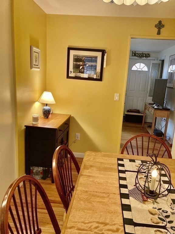56 Ridge Road South Hadley, MA 01075 - Photo 14 of 37 a bedroom with a bed and wooden floor