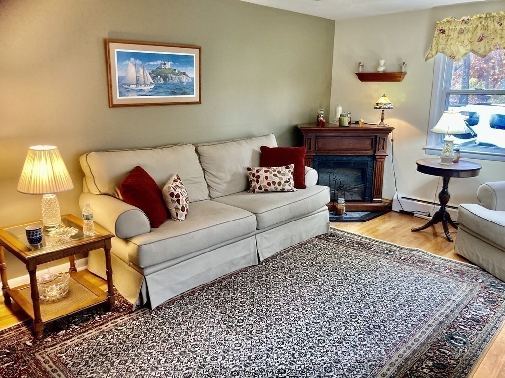 56 Ridge Road South Hadley, MA 01075 - Photo 18 of 37 a living room with furniture and a rug
