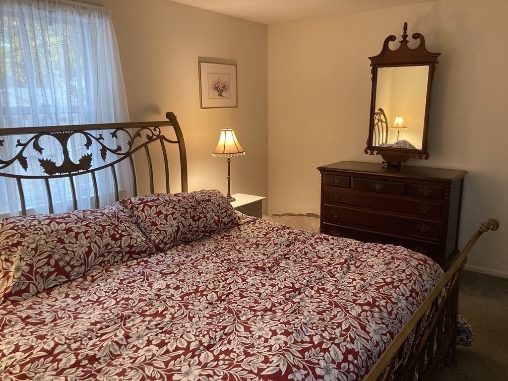 56 Ridge Road South Hadley, MA 01075 - Photo 22 of 37 a bedroom with a bed and a dresser