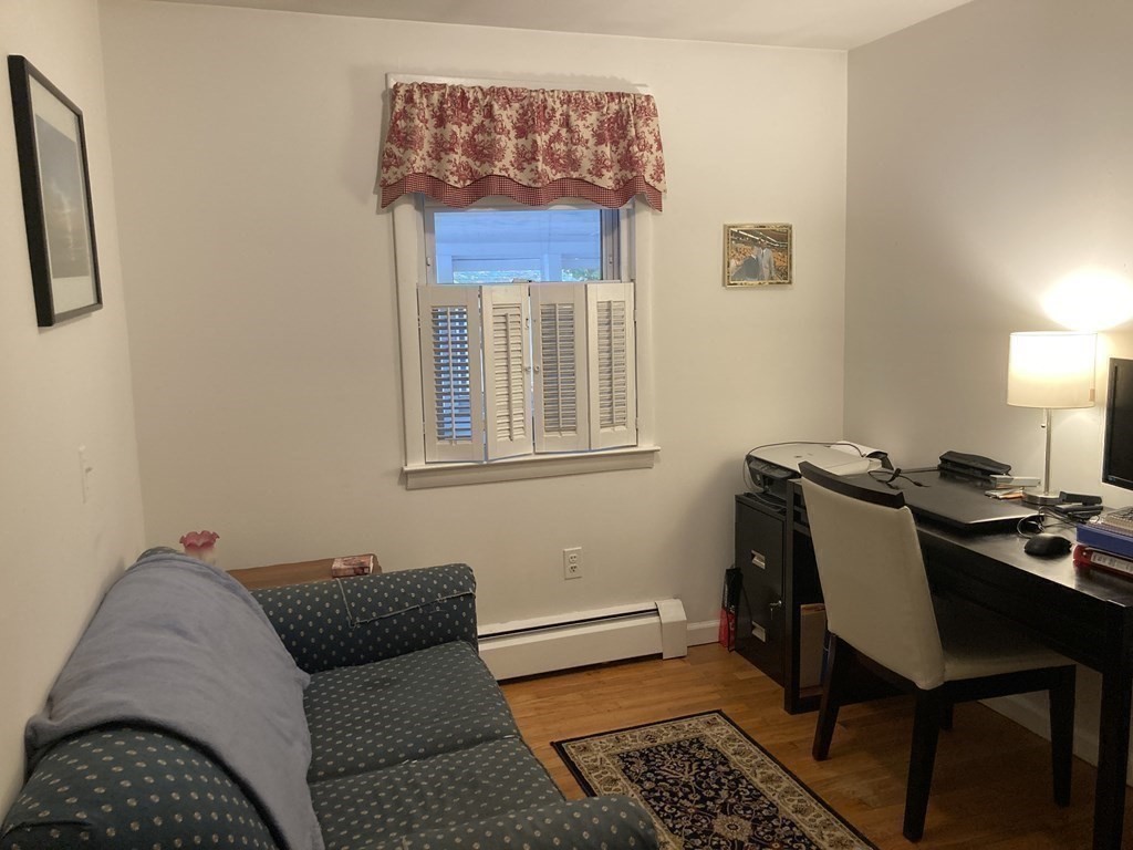 56 Ridge Road South Hadley, MA 01075 - Photo 24 of 37 a living room with furniture and a window