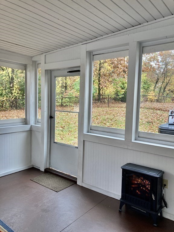 56 Ridge Road South Hadley, MA 01075 - Photo 27 of 37 an empty room with windows and fireplace