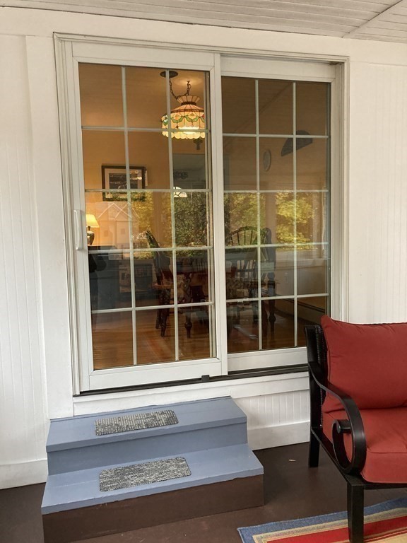 56 Ridge Road South Hadley, MA 01075 - Photo 28 of 37 a view of a lounge chair in front of house