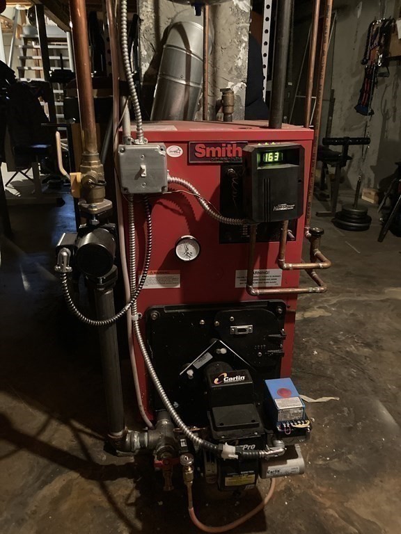 56 Ridge Road South Hadley, MA 01075 - Photo 32 of 37 a close up of water heater