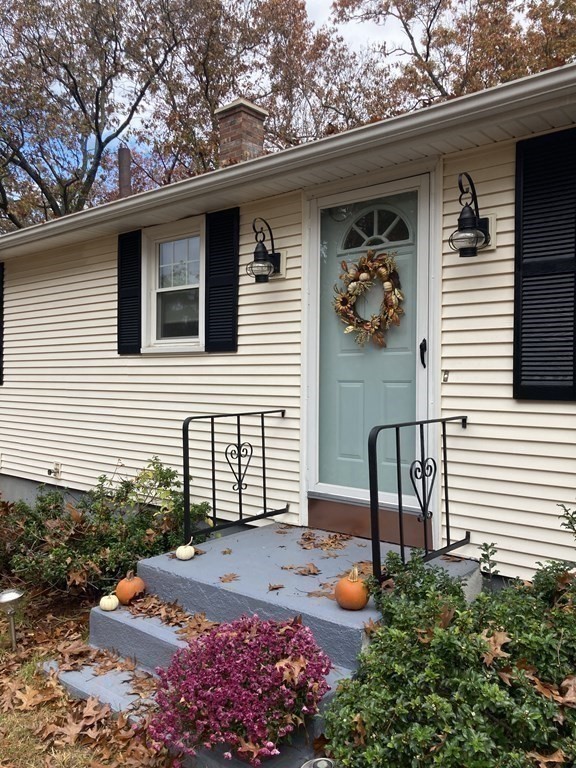 56 Ridge Road South Hadley, MA 01075 - Photo 4 of 37 a backyard of a house with outdoor seating