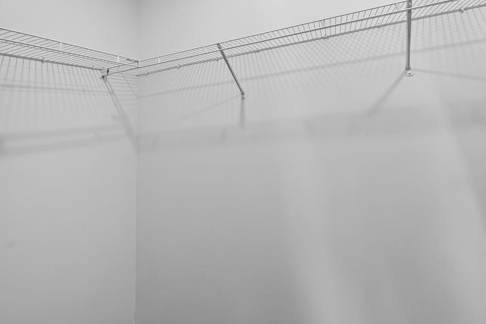 2831 Rosehall Way Lawrenceville, GA 30044 - Photo 21 of 53 a view of a room with racks on the wall