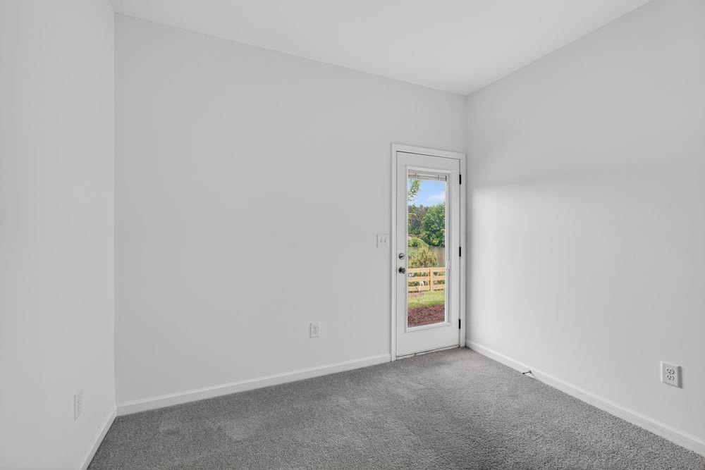 2831 Rosehall Way Lawrenceville, GA 30044 - Photo 22 of 53 an empty room with windows