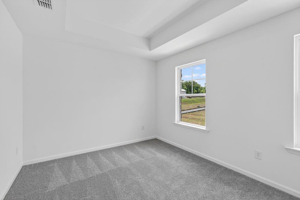 2831 Rosehall Way Lawrenceville, GA 30044 - Photo 23 of 53 an empty room with a window