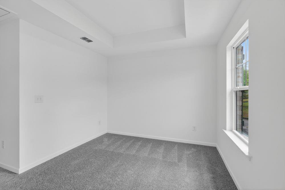 2831 Rosehall Way Lawrenceville, GA 30044 - Photo 24 of 53 a view of an empty room with a window