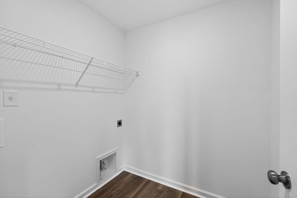 2831 Rosehall Way Lawrenceville, GA 30044 - Photo 37 of 53 a view of storage and utility room with wooden floor