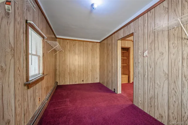 a view of a room with a windows and stairs