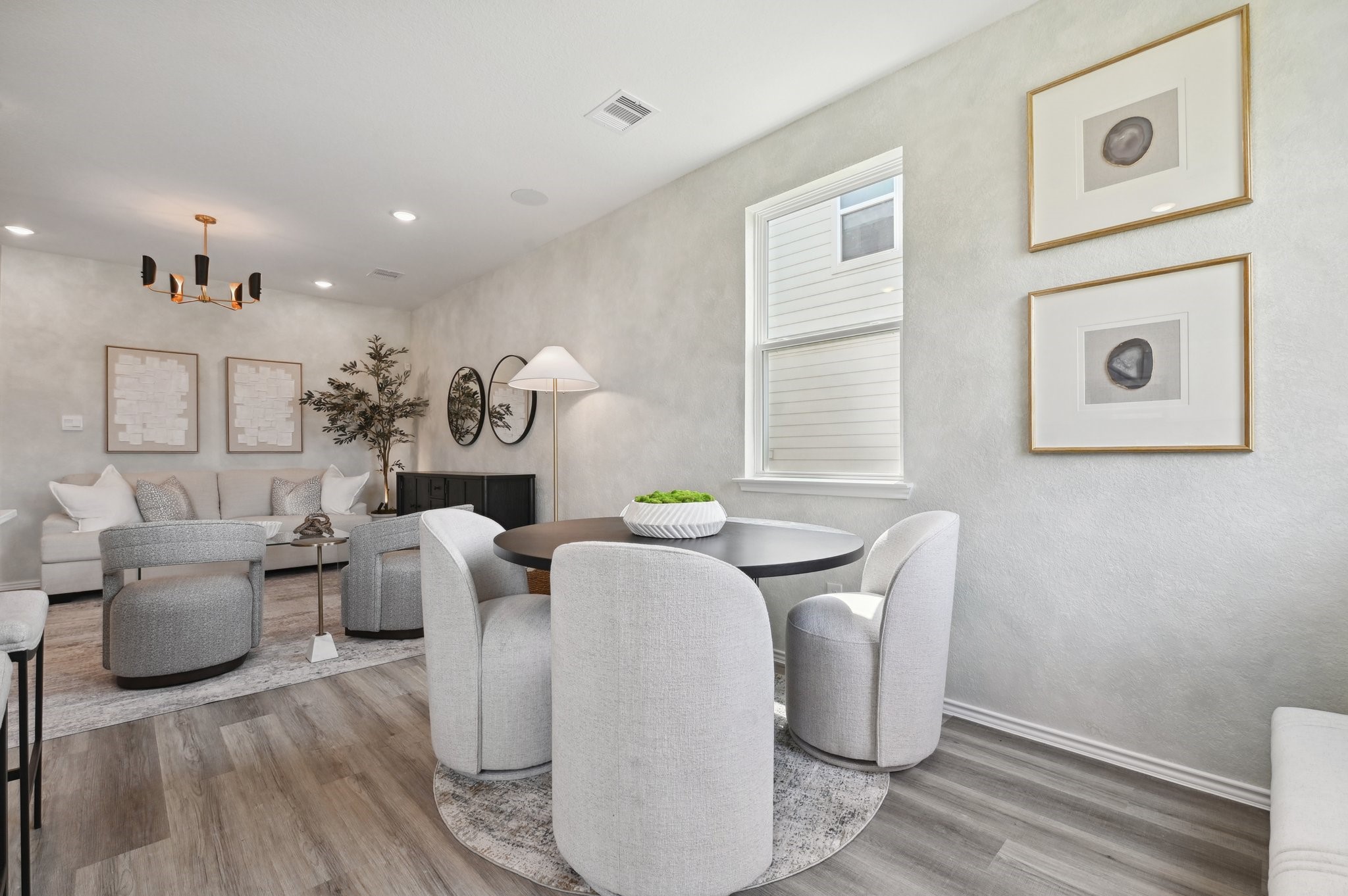 16911 Vinters Way Houston, TX 77090 - Photo 11 of 26 a living room with furniture and a fireplace