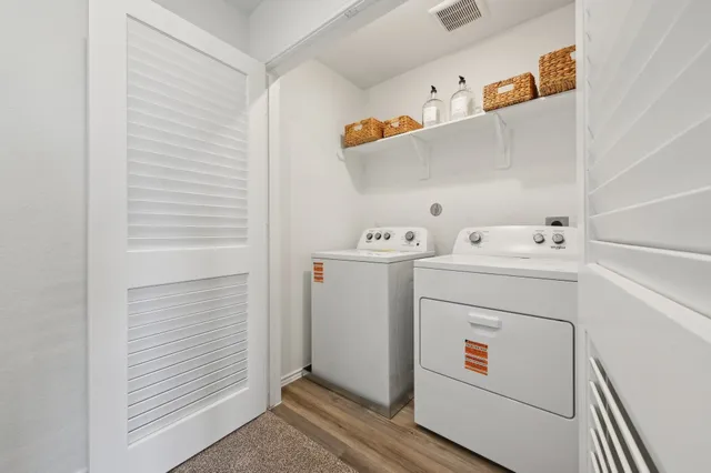a utility room with dryer and washer