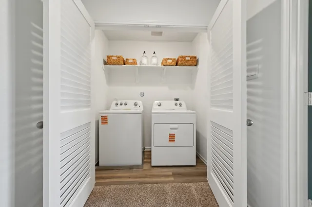 a utility room with dryer and washer