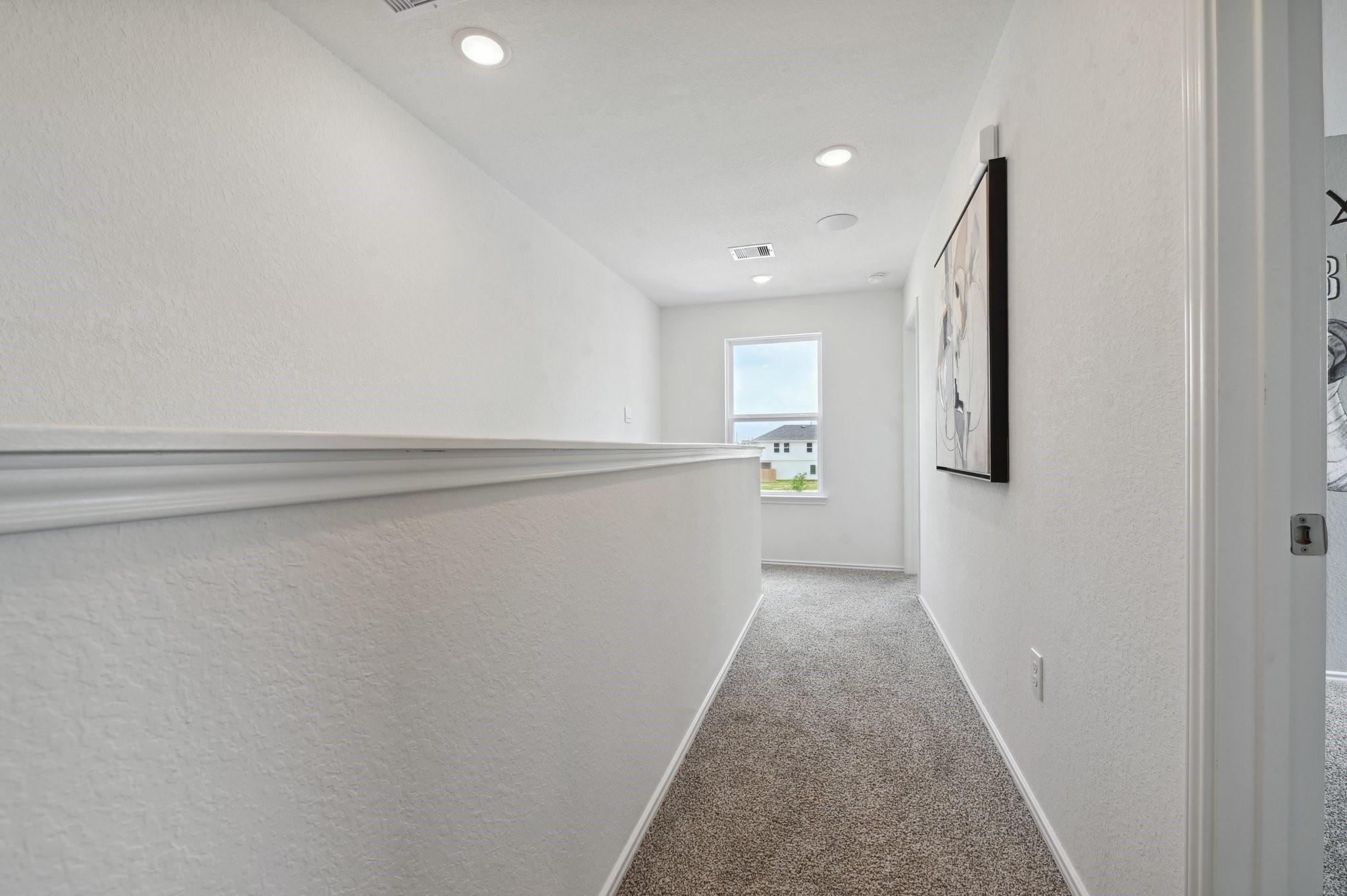 16911 Vinters Way Houston, TX 77090 - Photo 22 of 26 a view of a hallway with wooden floor