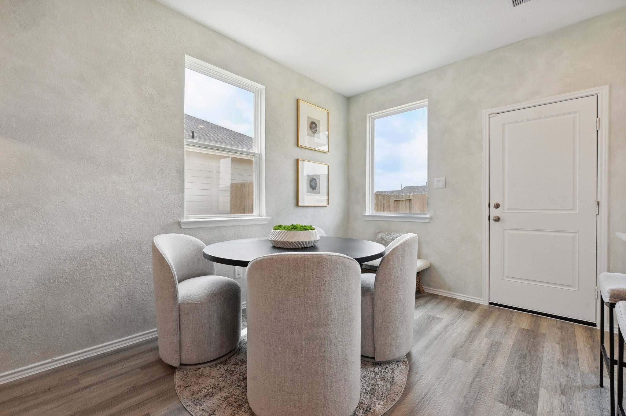16911 Vinters Way Houston, TX 77090 - Photo 9 of 26 a living room with furniture and wooden floor