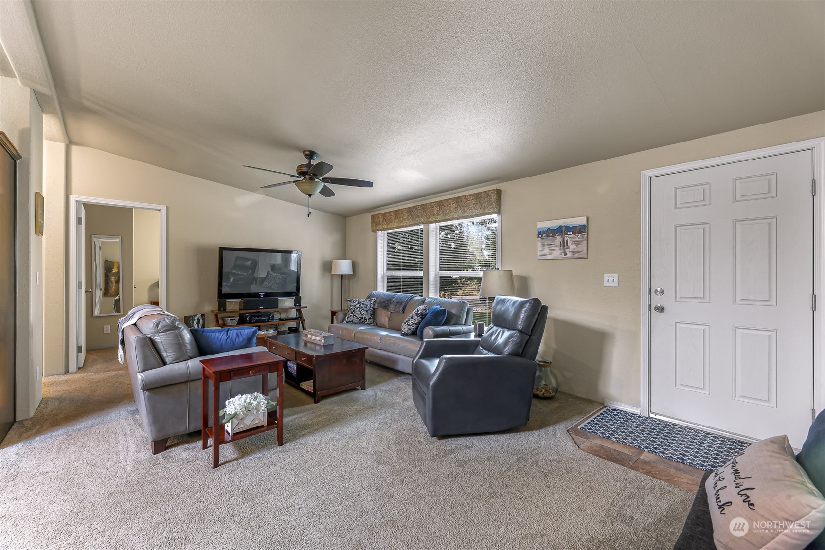 4524 Decatur Drive Ferndale, WA 98248 - Photo 7 of 30 a living room with furniture or couch and a flat screen tv