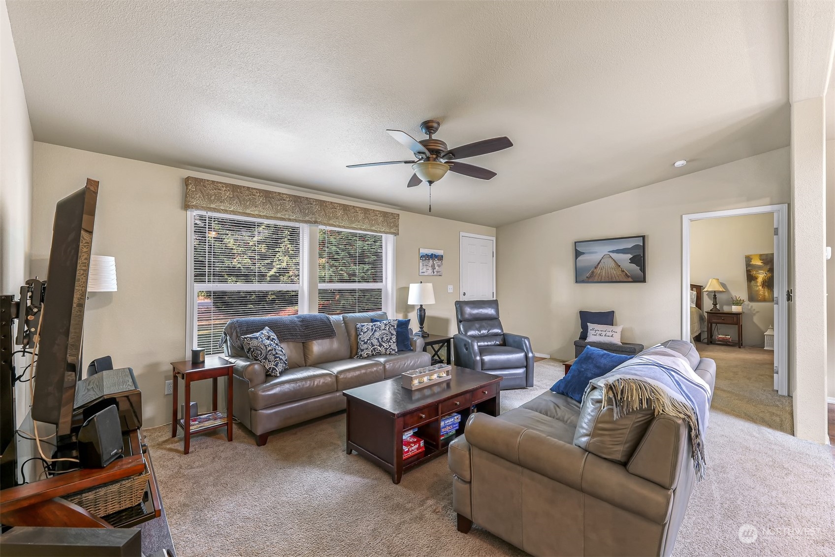 4524 Decatur Drive Ferndale, WA 98248 - Photo 9 of 30 a living room with furniture ceiling fan and a window