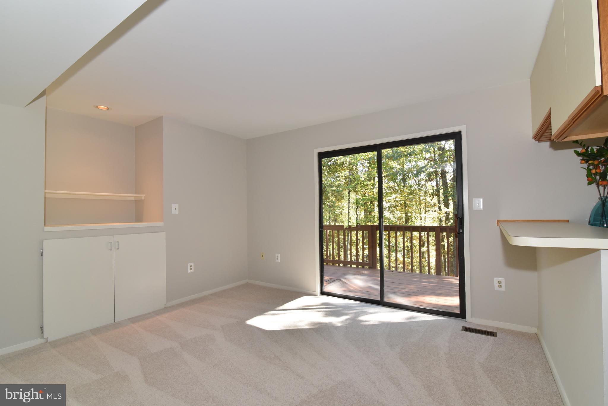 11117 Glade Drive Reston, VA 20191 - Photo 37 of 75 The deck is accessible from the kitchen & fam. rm.