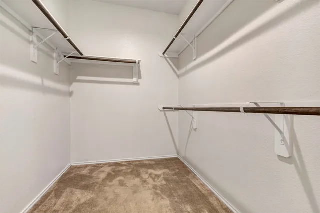 a view of a room with racks on the wall