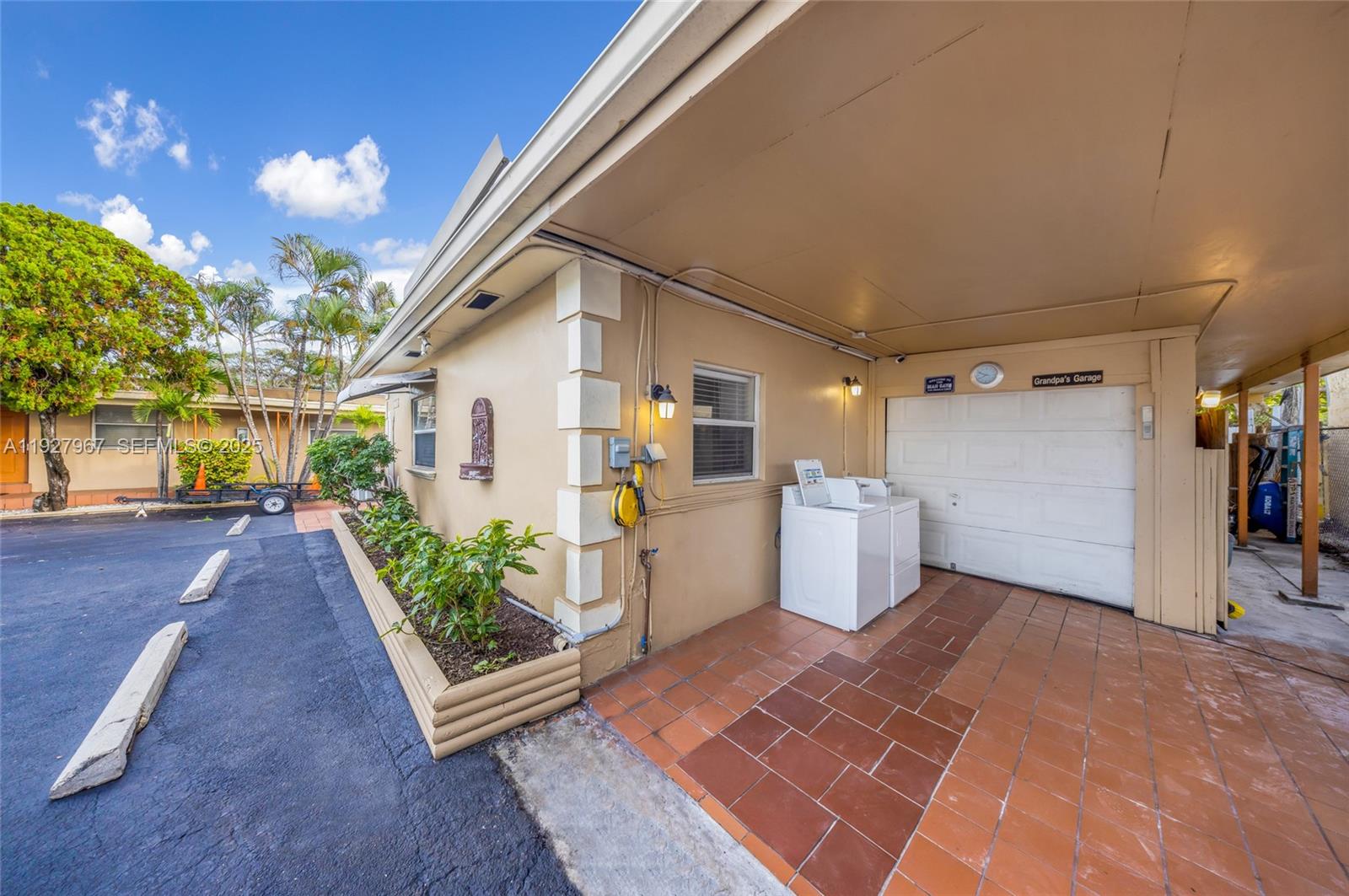 6124 Pembroke Road Miramar, FL 33023 - Photo 5 of 20 a view of a porch with wooden floor and fence