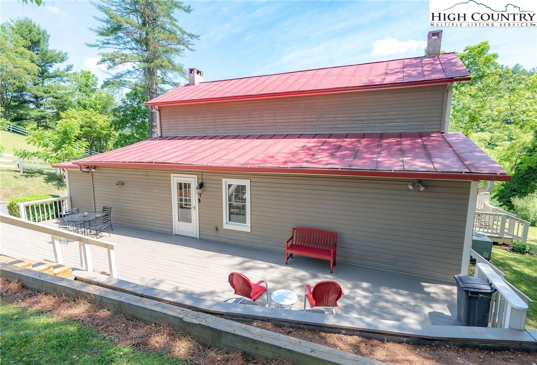2280 Garvey Bridge Road Crumpler, NC 28617 - Photo 11 of 45 a front view of a house with yard