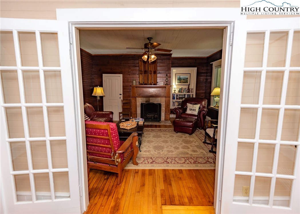 2280 Garvey Bridge Road Crumpler, NC 28617 - Photo 19 of 45 a living room with fireplace furniture and a fireplace