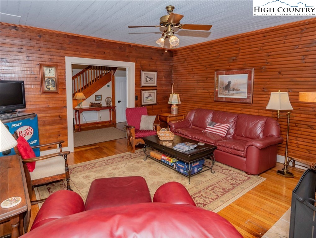 2280 Garvey Bridge Road Crumpler, NC 28617 - Photo 23 of 45 a living room with furniture and a flat screen tv