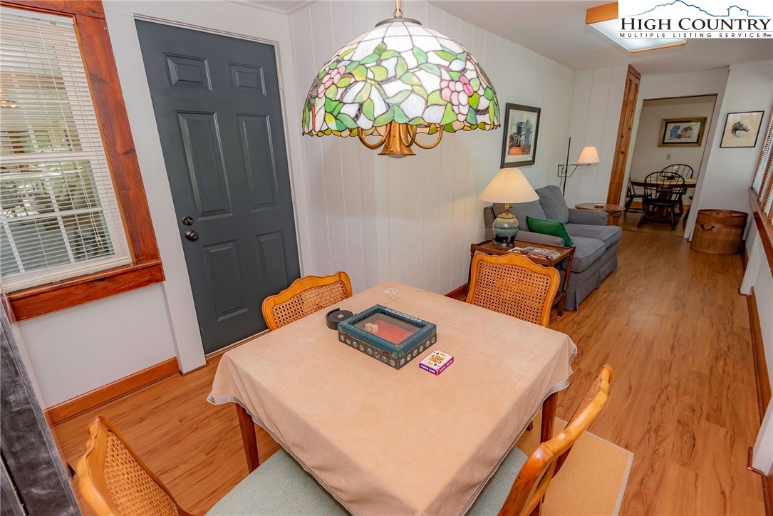 2280 Garvey Bridge Road Crumpler, NC 28617 - Photo 32 of 45 a bedroom with a bed and a table in it