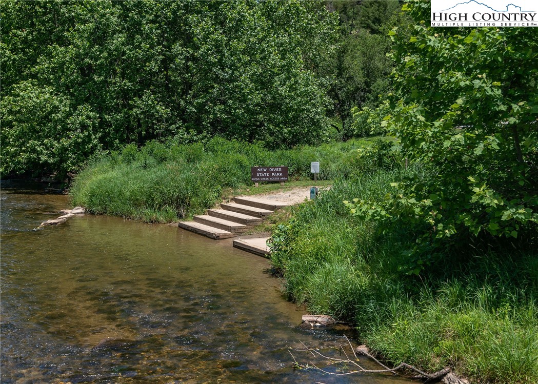 2280 Garvey Bridge Road Crumpler, NC 28617 - Photo 44 of 45 a view of lake with green space