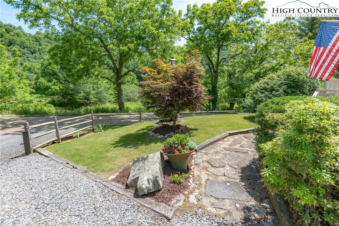 2280 Garvey Bridge Road Crumpler, NC 28617 - Photo 5 of 45 a view of a backyard with water fountain