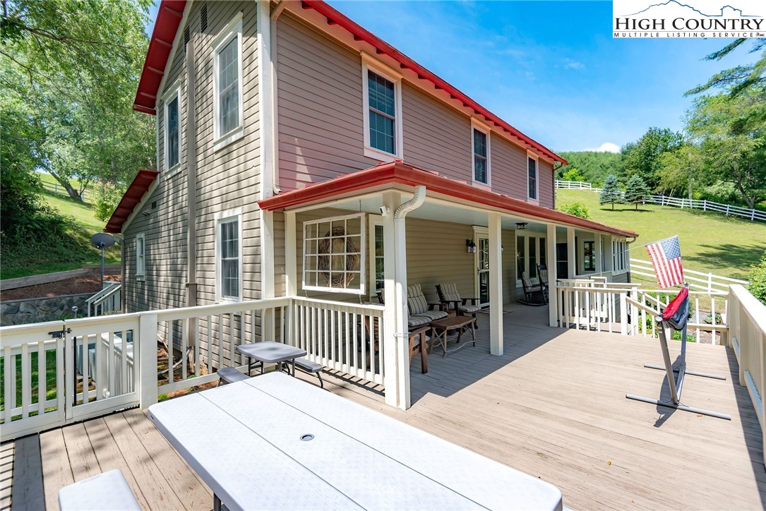 2280 Garvey Bridge Road Crumpler, NC 28617 - Photo 6 of 45 a view of a house with a wooden deck