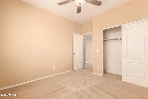 an empty room with a bathroom