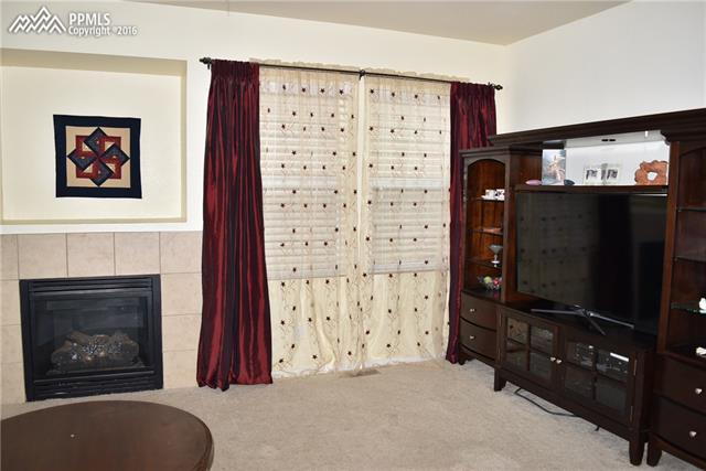 1620 Smokey Ridge Way Colorado Springs, CO 80921 - Photo 7 of 13 Family room
