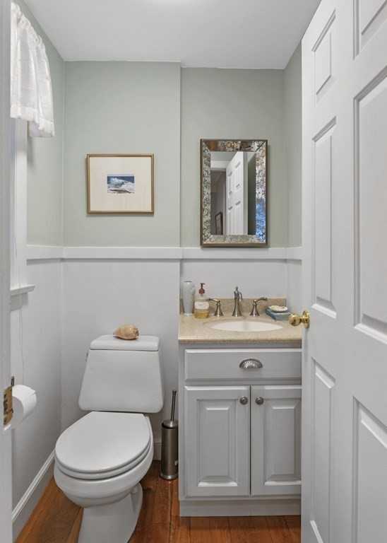 1 Wallingford Road Marblehead, MA 01945 - Photo 13 of 42 a bathroom with a granite countertop toilet sink and mirror