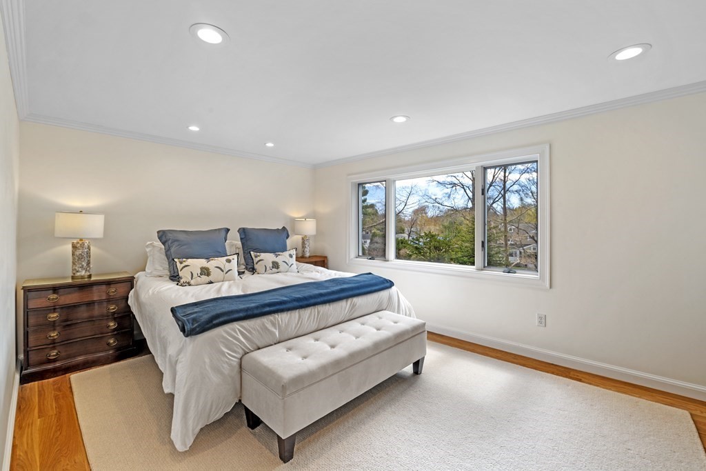 1 Wallingford Road Marblehead, MA 01945 - Photo 22 of 42 a bedroom with a bed and a window