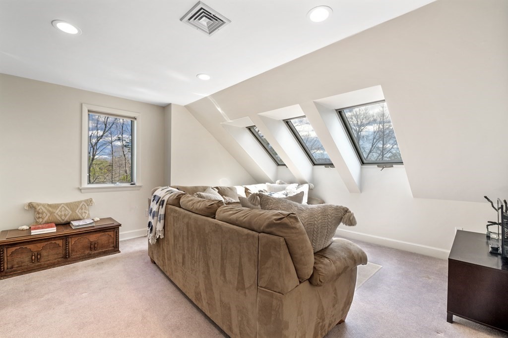 1 Wallingford Road Marblehead, MA 01945 - Photo 35 of 42 a living room with furniture and a flat screen tv