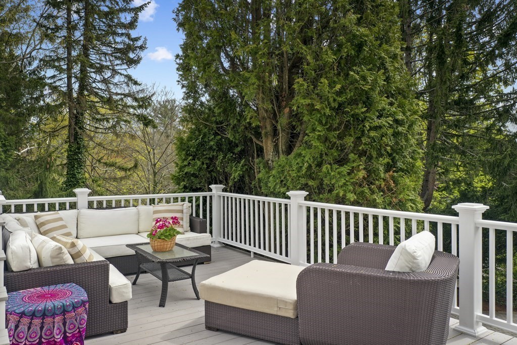 1 Wallingford Road Marblehead, MA 01945 - Photo 42 of 42 a roof deck with couches and wooden fence